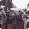 The Club of Committed Non-Party Members also took part in the May Day parade in 1968. Its Chairman, Ludvík Rybáček, is the second man from the left, and Rudolf Battěk is the third man from the left. (1 May 1968, source: Institute for Contemporary History)